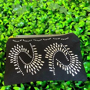 New small black clutch or bag insert for storage.